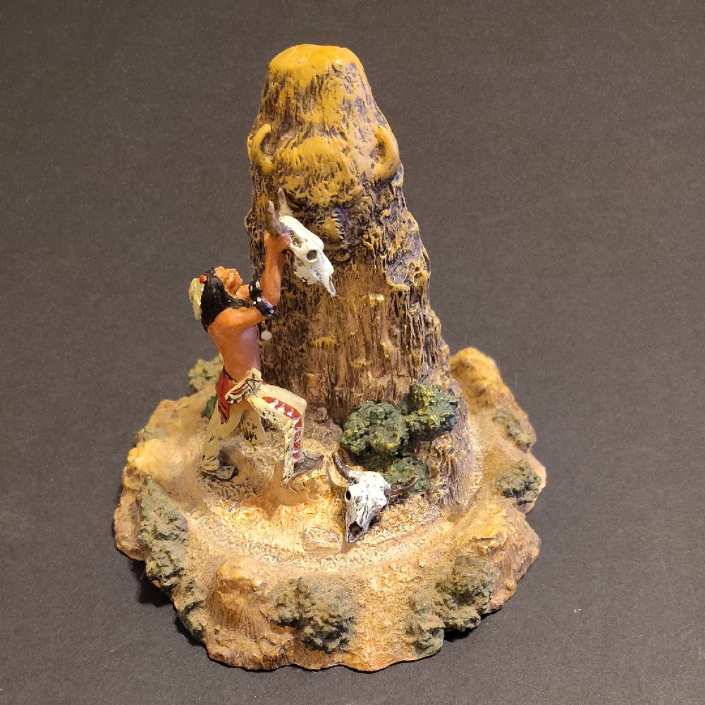 Native American Figurine with Mountain Scene